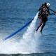 A man flying a water jet pack